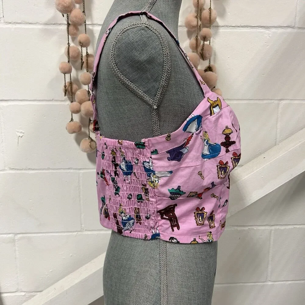 Her Universe Pink Alice Print Cropped Tank Top